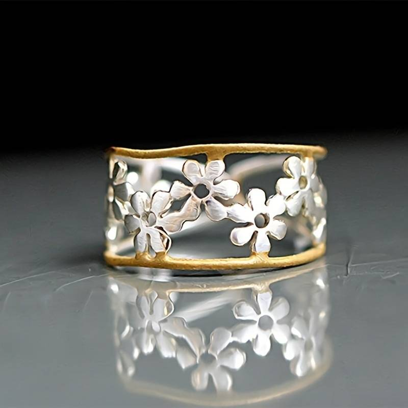 Irregular hollow daisy ring